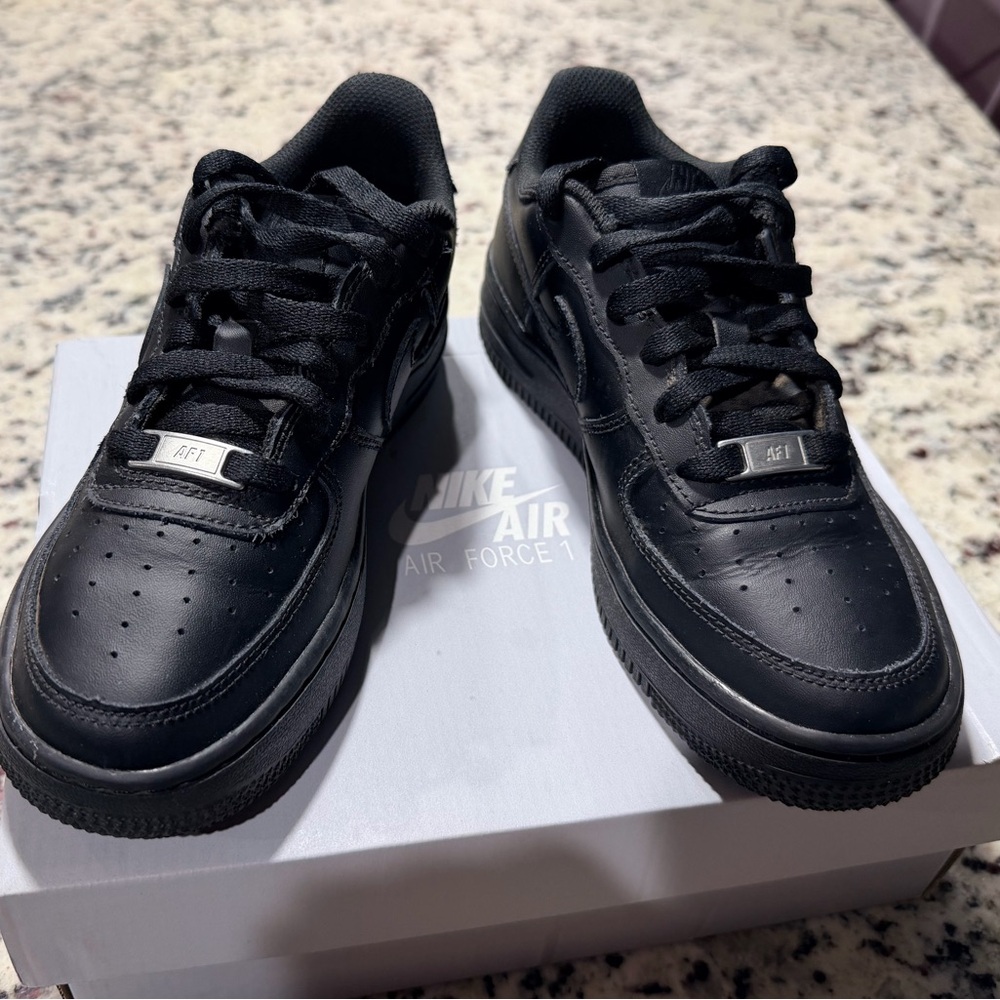 Nike All-Black Leather Air Force 1 Low Sneakers